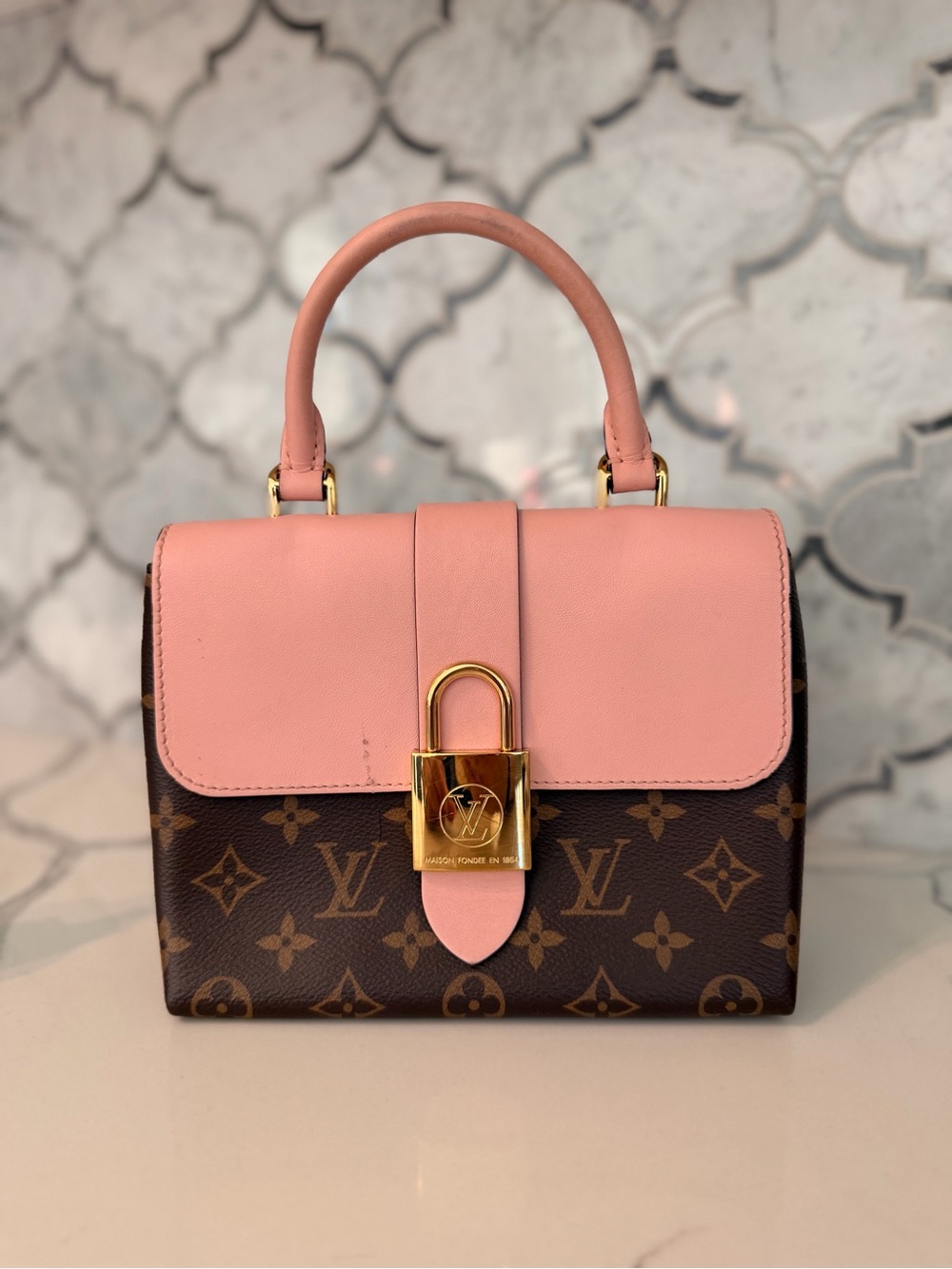 Louis Vuitton Locky BB Leather Handbag